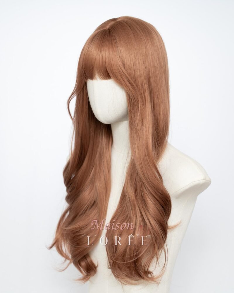 Ondulée blonde dorée avec frange