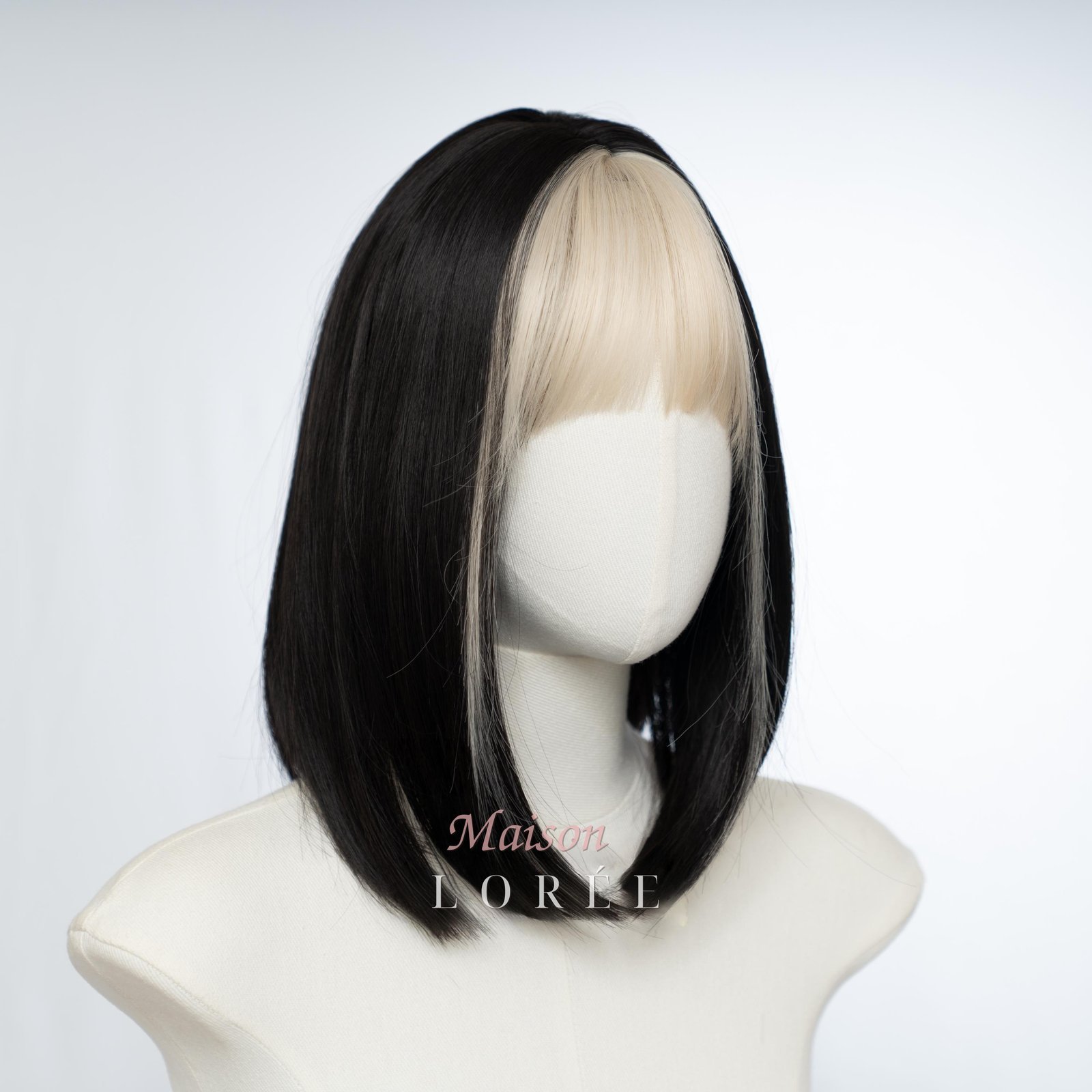 Perruque noire et blonde avec frange